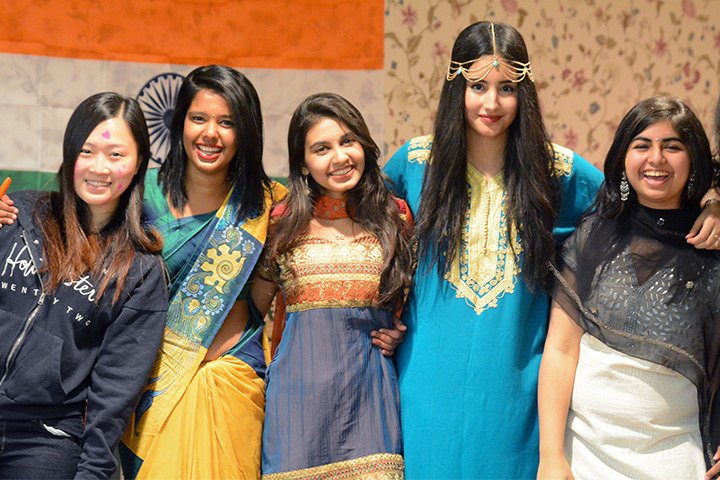 female students in cultural dress